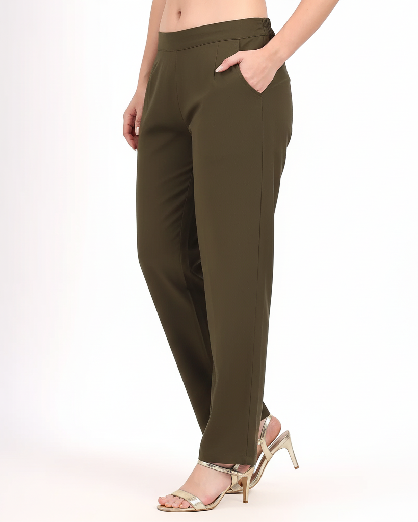 Olive green pants worn by a person on a white background
