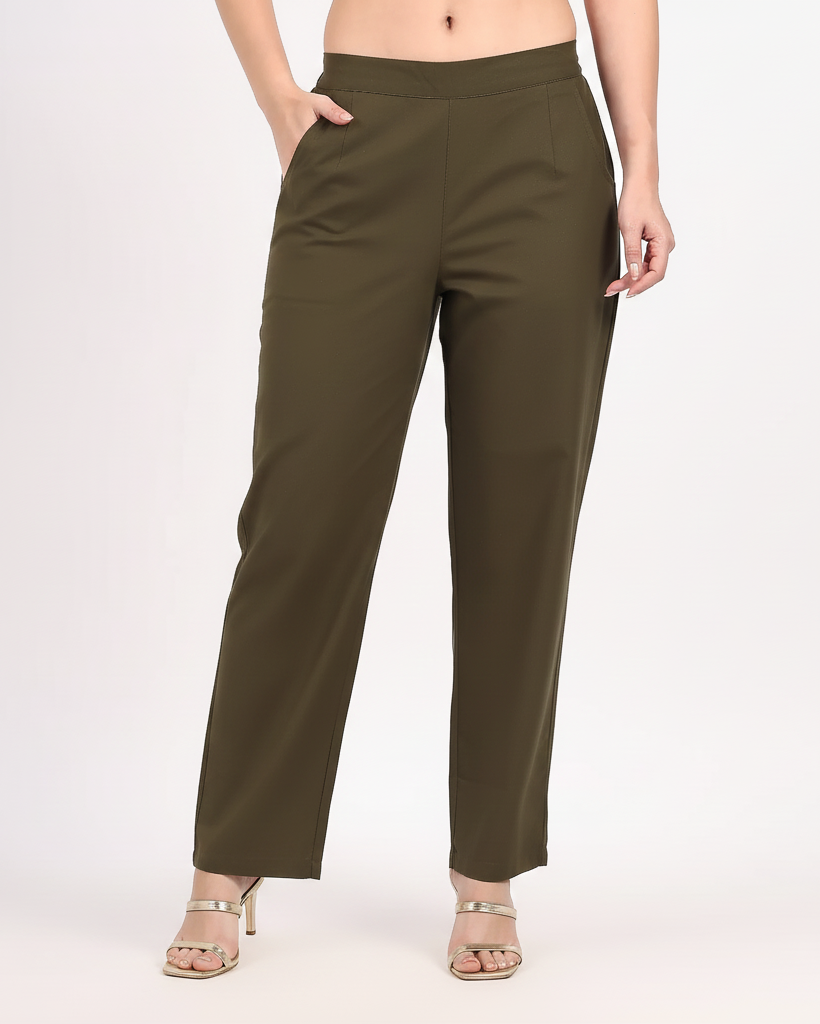 Olive green pants worn by a person on a white background